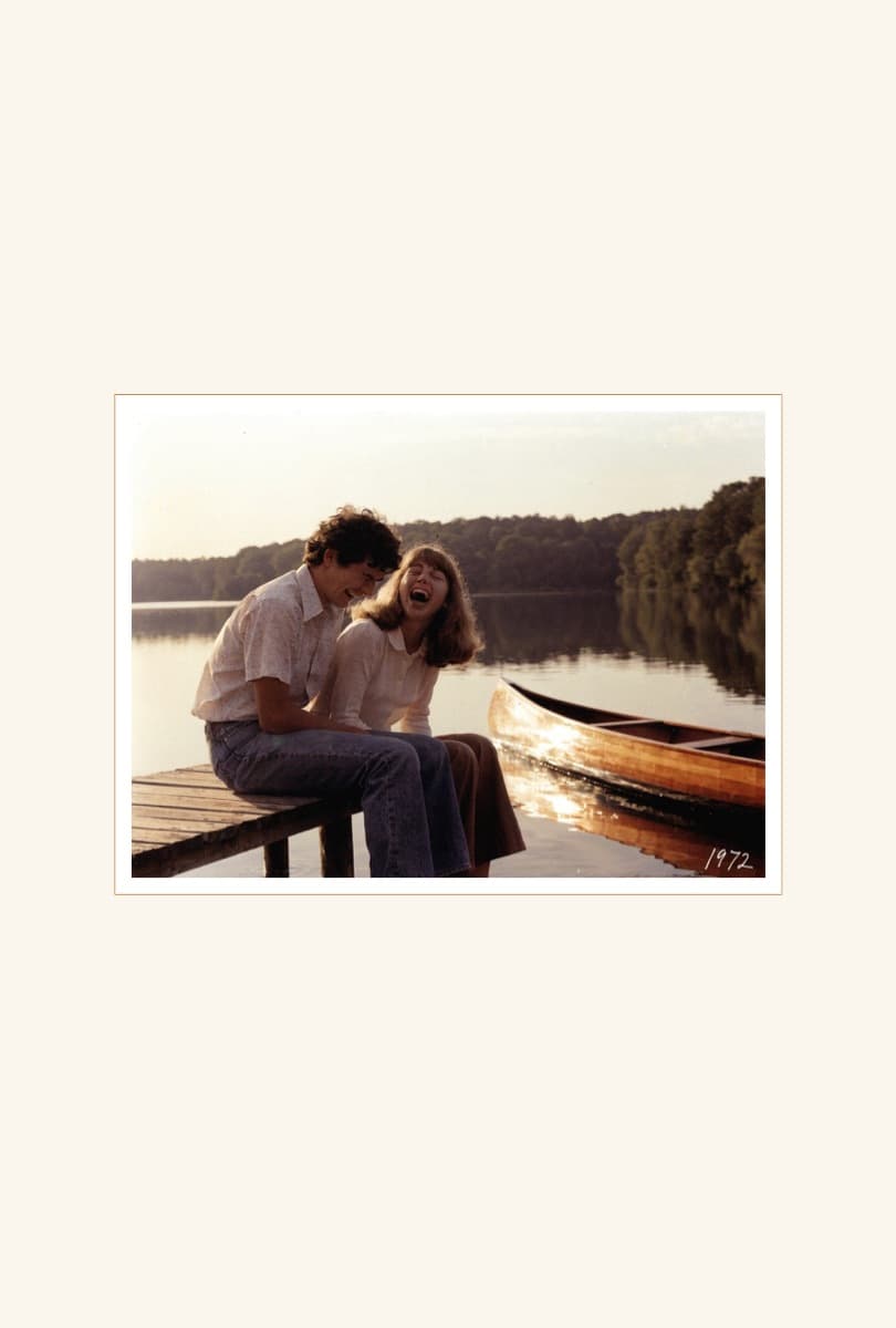 A page from Kept4's demonstration book: a photograph of a young couple laughing on a dock, mounted like a print